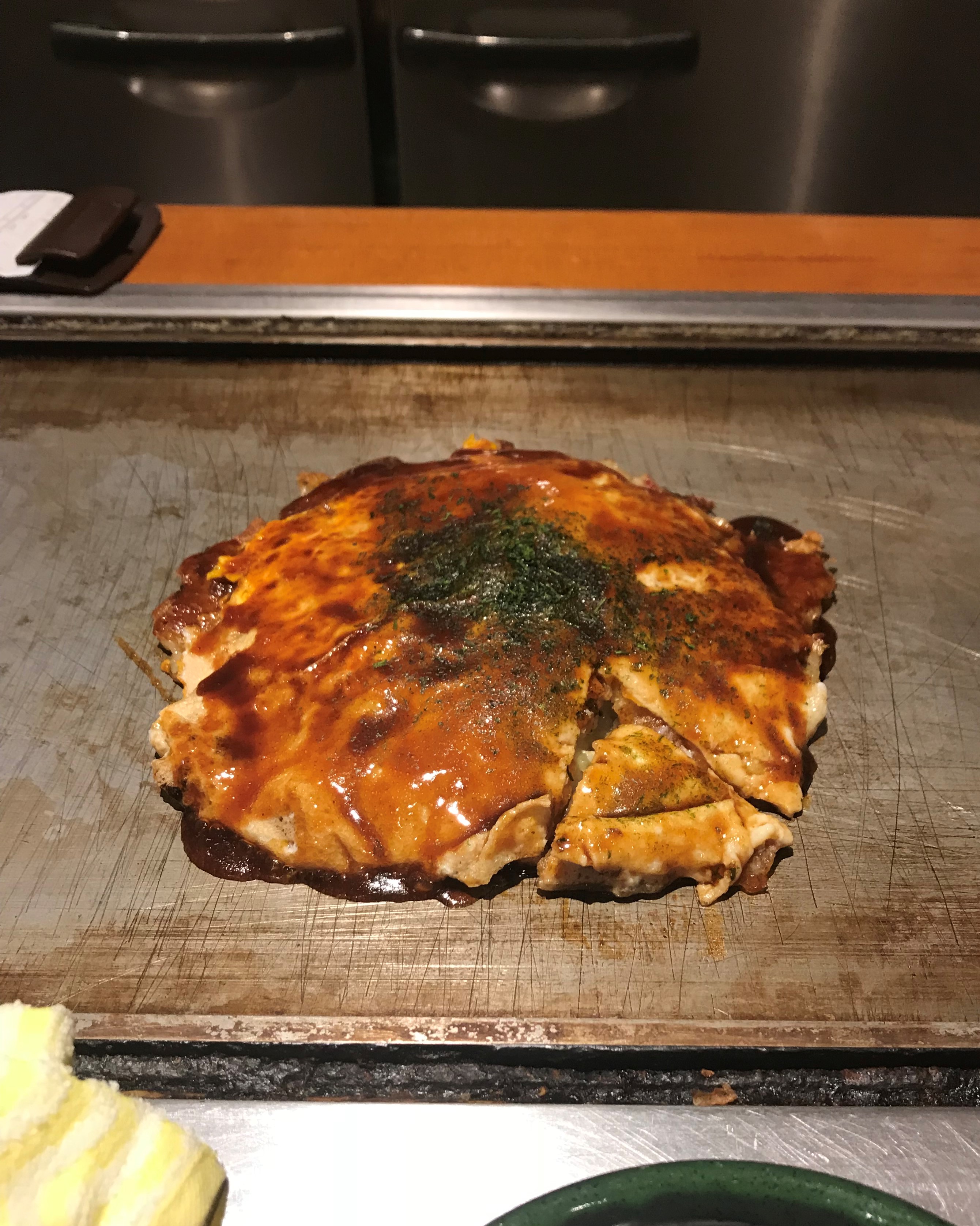 Okonomiyaki on a griddle